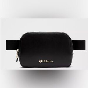 BNWT Lululemon Alternative Leather Black Pouch with Lululemon Storage Bag!